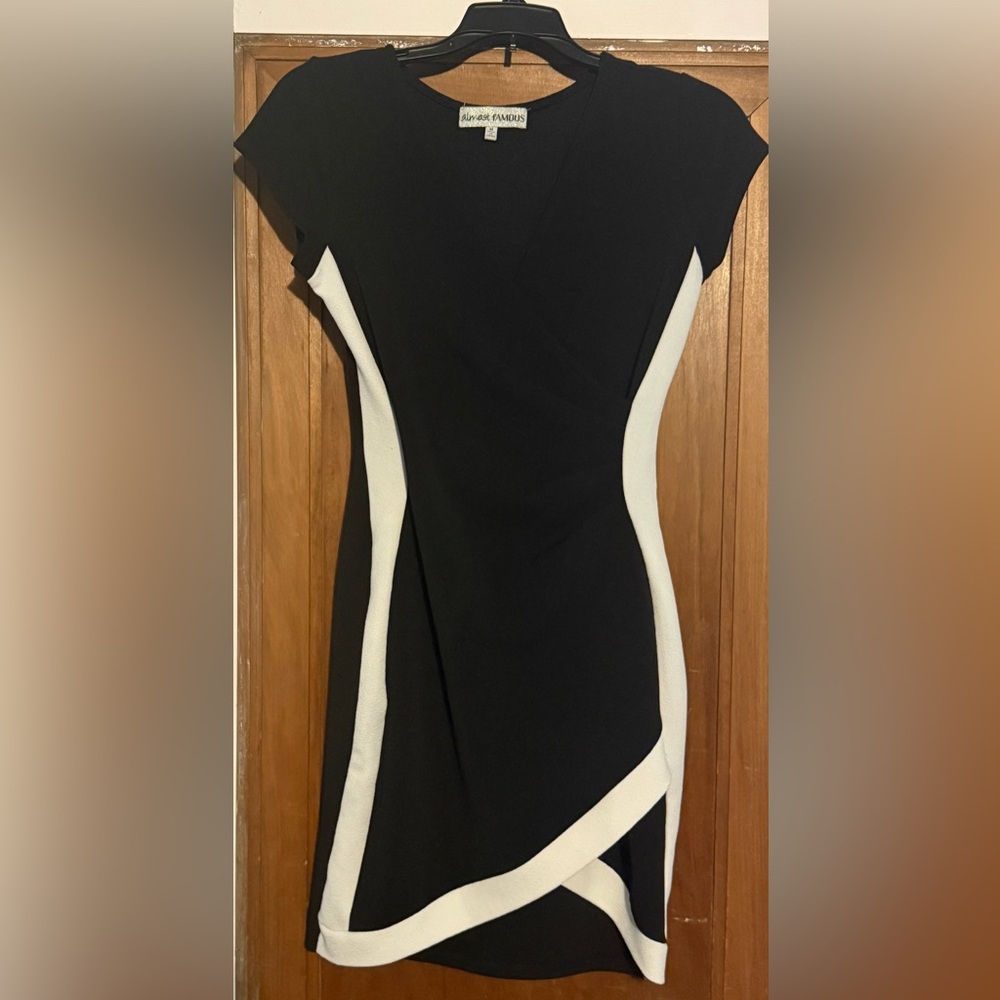 Almost Famous Asymmetrical Dress in Black and White